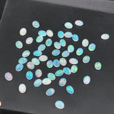 Natural Ethiopian Opal Oval Cabochons – 3x5mm to 9x11mm – AAA+ Quality – Smooth Polished Gemstones for Jewelry Making